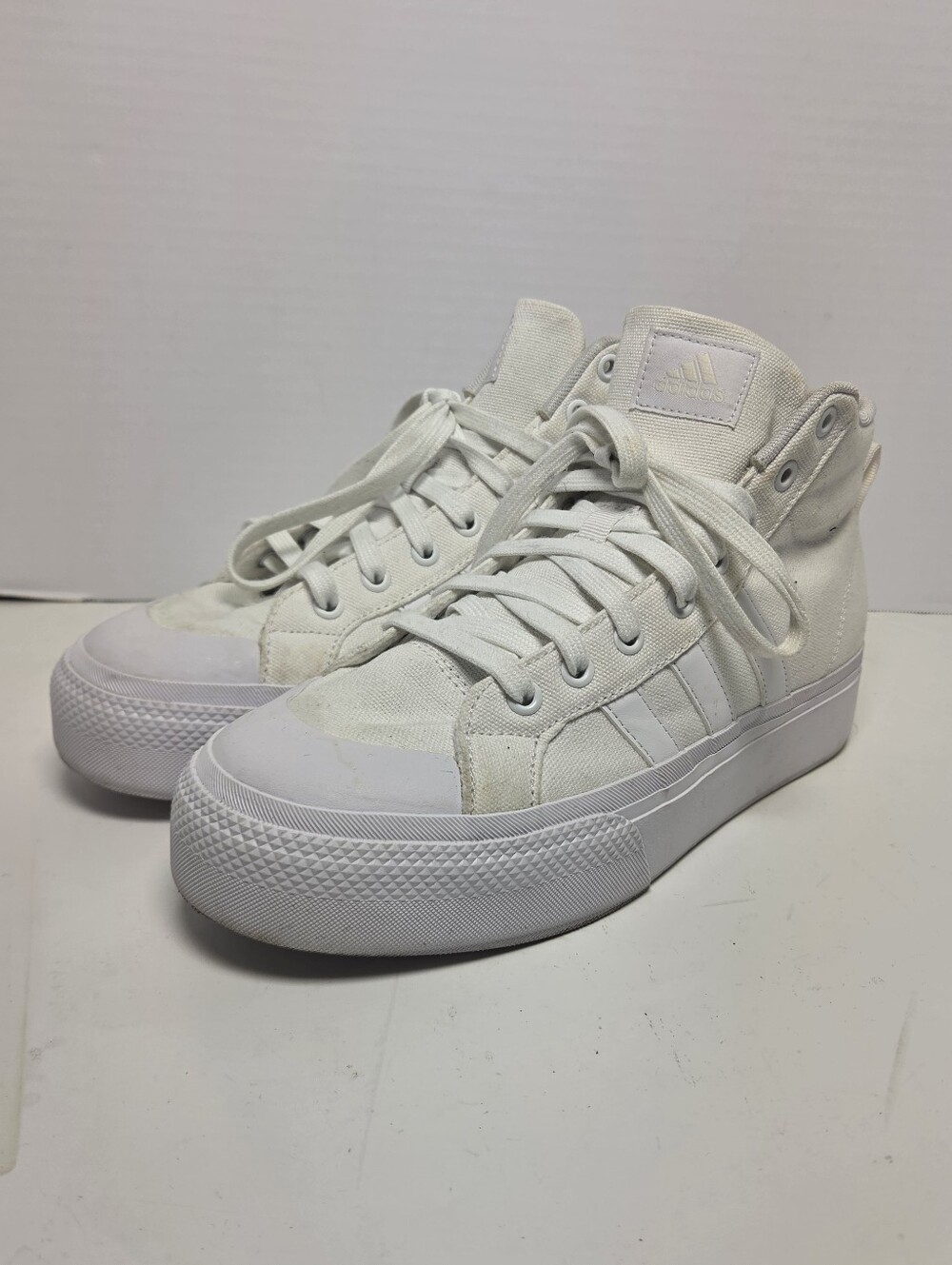 adidas Bravada 2.0 Platform Mid Triple White Canvas Sneakers